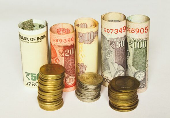 assorted-denomination banknote and coin lot