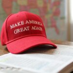 a red hat that reads make america great again