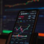 black android smartphone on brown wooden table