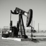 a black and white photo of an oil pump