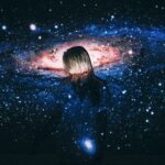 woman in black leather jacket looking at stars